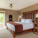 Bed with view outside in High Desert Suite