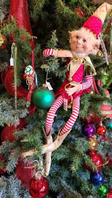 An elf in a Christmas tree