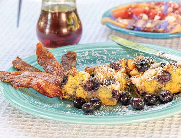 Breakfast plate with blueberries and bacon