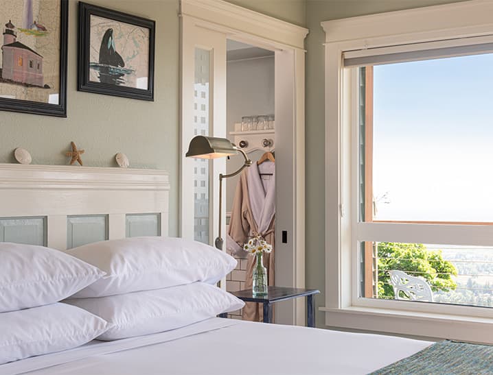 Close up of pillows on bed in Oregon Coast Room