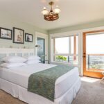 Queen bed in Oregon Coast Room