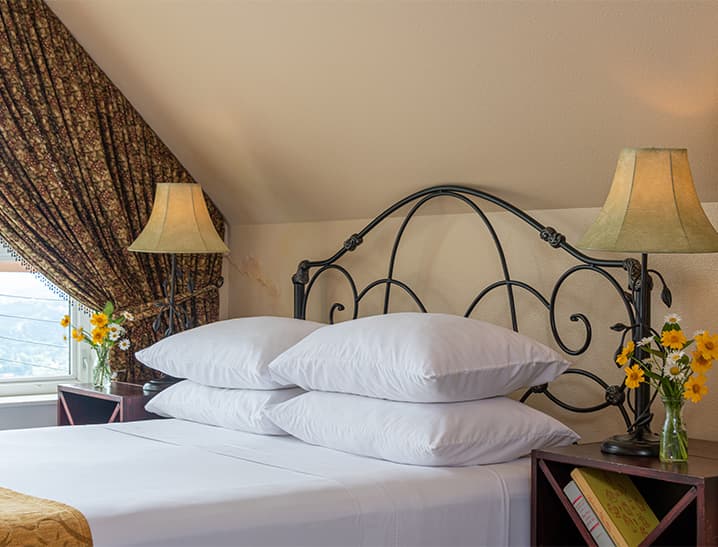 Pillows on bed in Wine Country Room