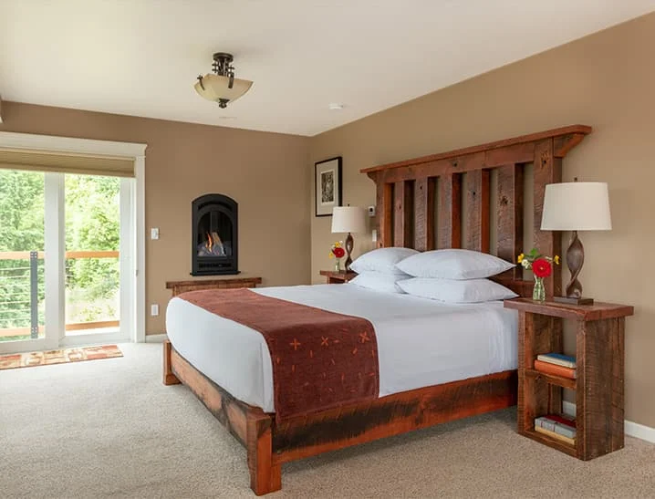 Bed with view outside in High Desert Suite
