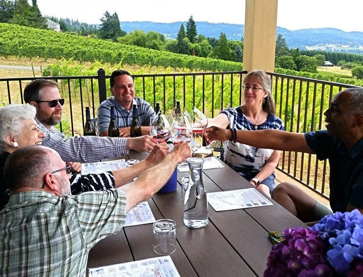 Willamette Valley Wine Tasting group enjoying wine outside